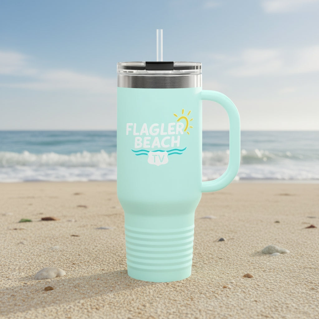 Mint green travel mug with 'Flagler Beach' text on a white background