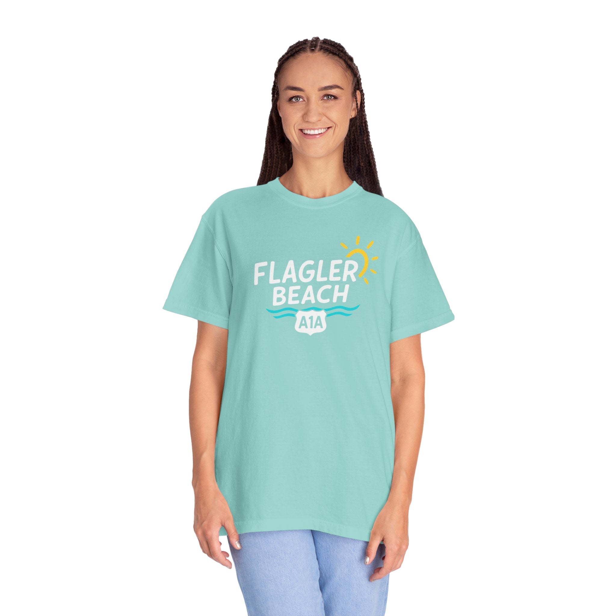 Woman wearing a light blue t-shirt with 'Flagler Beach' text on a white background